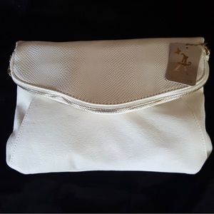 IVORY COLORED cross body with detachable SHOULDER
STRAP NWT